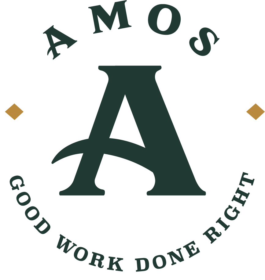 The Amos badge: a craftsman in a straw hat, the mark of our crew.